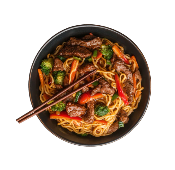 Bowl of stir-fried beef and noodles with red peppers and broccoli served with chopsticks