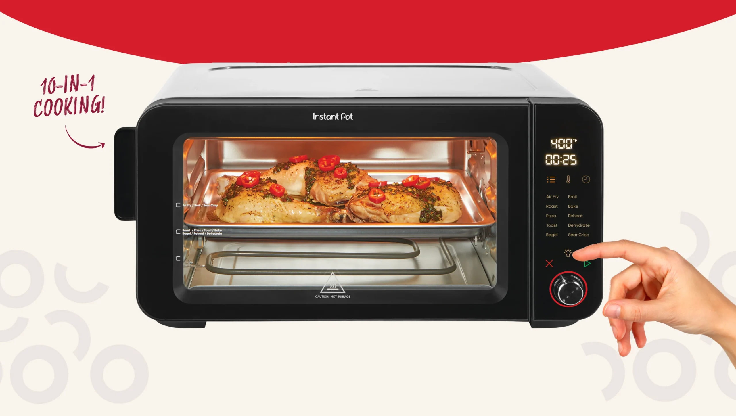 An Instant Pot 6-Slice InstantHeat Air Fryer Toaster Oven with food roasting inside on a baking tray. The digital display on the right shows a temperature of 400°F and a timer set to 25 minutes. A hand is adjusting the control knob. To the left of the oven, bold red text reads 10-IN-1 COOKING! with an arrow pointing toward the appliance.